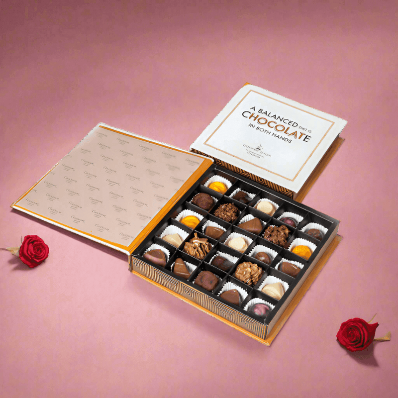 Handmade Cinnamon Grand premium chocolate gift box with 16 and 25 piece options on a Sri Lanka delivery tray