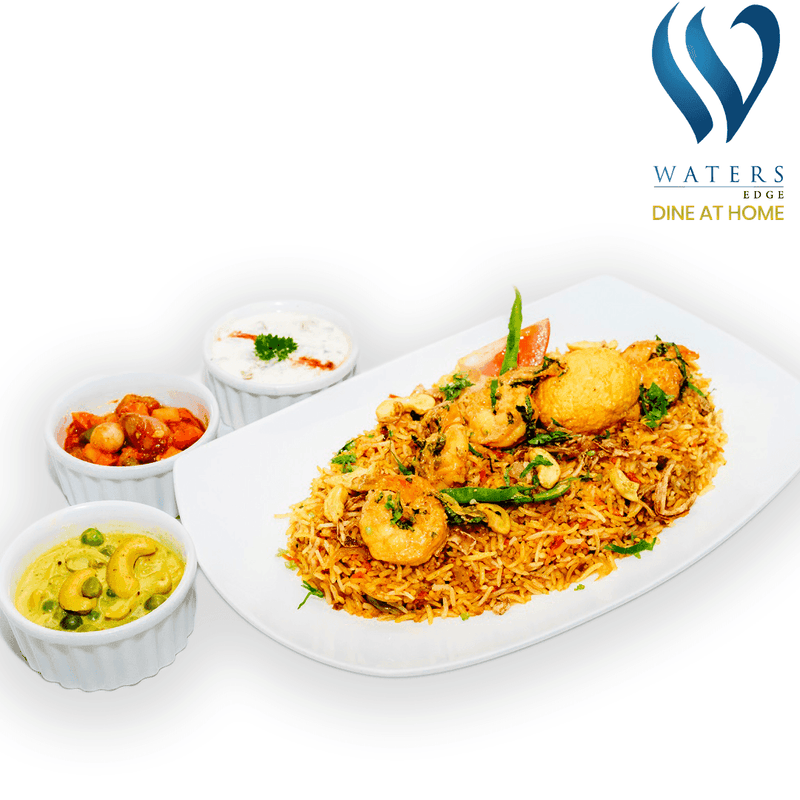 Waters Edge Prawn Biriyani Pack by Yalu Yalu: prawn biriyani rice, boiled & fried egg, cashew & pea curry, raita & Malay pickle in eco-friendly pack.
