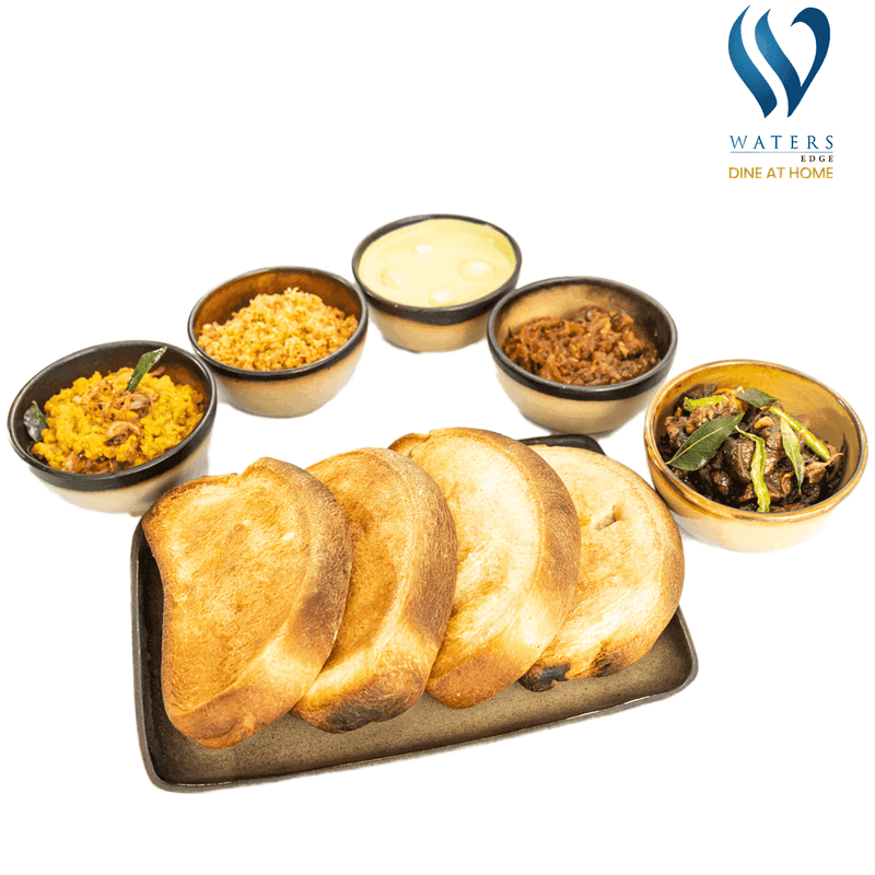 Waters Edge Roast Paan Family Meal Pack by Yalu Yalu: 4 roast paan, beef choice, egg curry, dhal curry, seeni sambol & pol sambol in eco pack.
